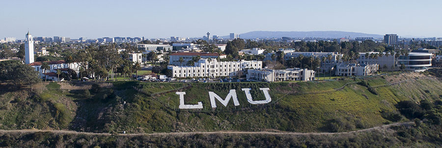 a photo of the LMU letters on the bluff